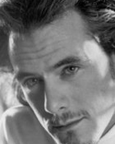 Лоуренс Гуган фото