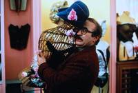 Кадр Услуга, часы и очень большая рыба