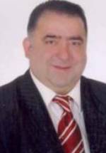 Тунджай Акса фото