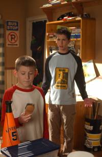 Кадр Малкольм в центре внимания