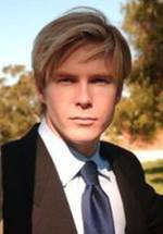 Адам Робител фото