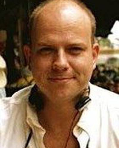 Норман Голайтли фото