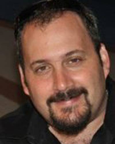 Аарон Л. Гилберт фото