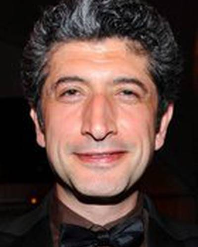 Риза Сёнмез фото