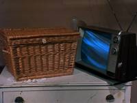 Кадр Существо в корзине