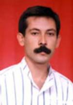 Юксель Аричи фото