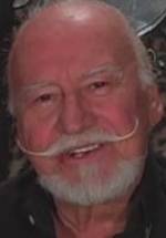 Тед В. Микелс фото