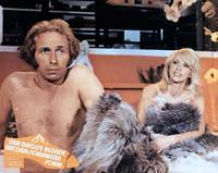 Кадр Высокий блондин в черном ботинке