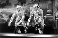 Кадр Поющие под дождем