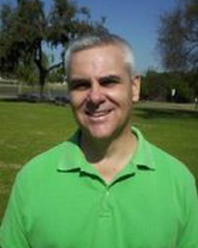 Брюс Е. Холман фото