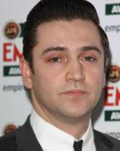 Рег Тревисс фото