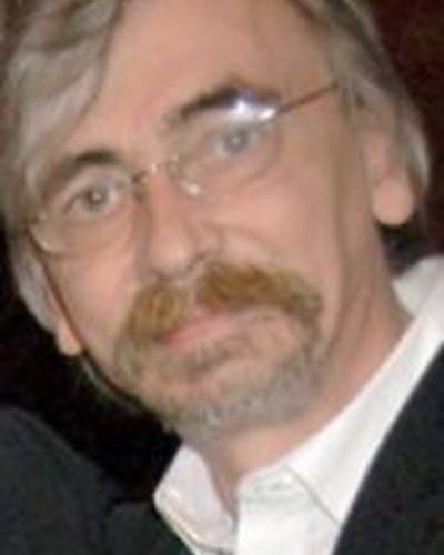 Джон Тэмс фото