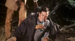 Кадр из фильма "Прикуси пулю" - 1