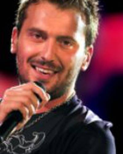 Чезаре Кремонини фото