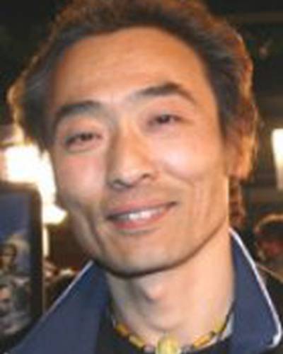 Цутому Китагава фото