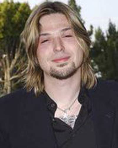 Дж. Макки Грубер фото