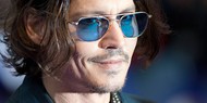 Джонни Депп сразится с Лиамом Нисоном в прокате