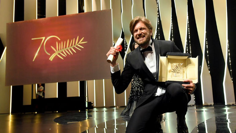 Режиссер фильма "Квадрат" Рубен Эстлунд с наградой