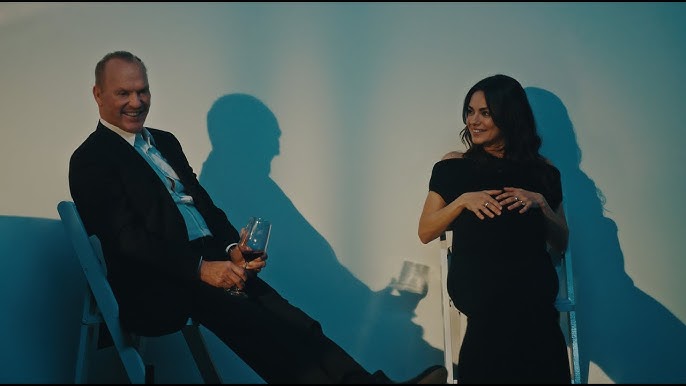 Майкл Кітон та Міла Куніс 